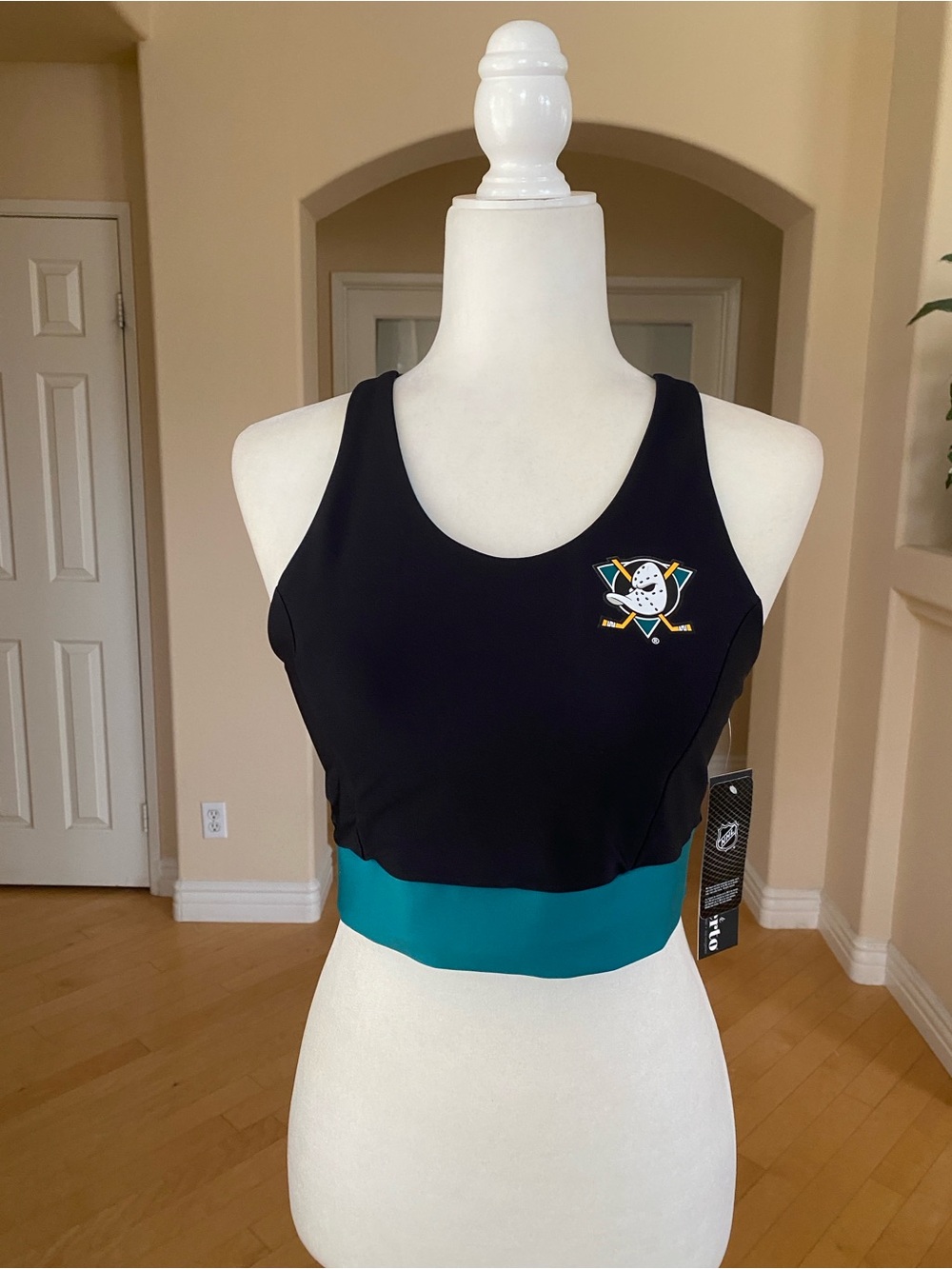 Anaheim Ducks Criss Cross Black Sports Bralette with Teal Band and Crest Patch
